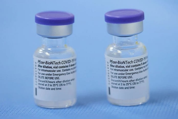 Vials of the Pfizer-BioNTech vaccine are pictured in a vaccination centre in Geneva, Switzerland, February 3, 2021. PHOTO: REUTERS